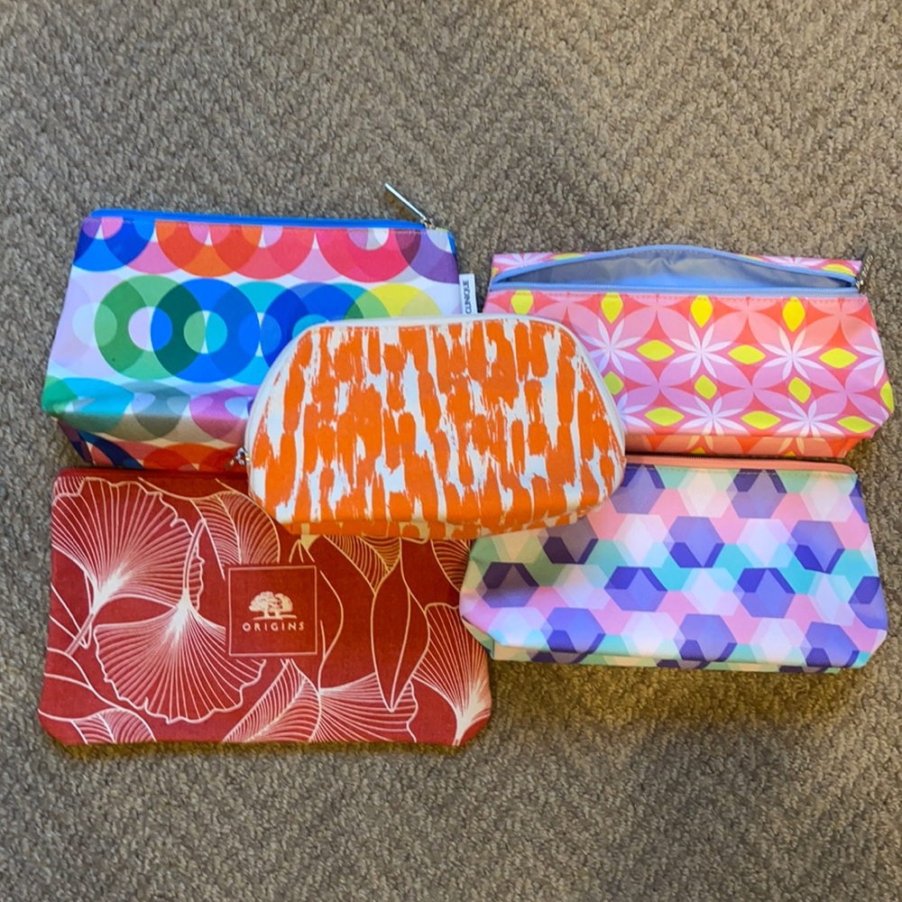 Clinique and origins make-up bags